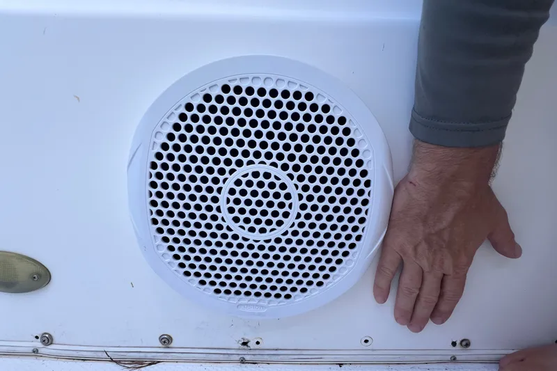 Slide: The Image of Close-up of a speaker on a 2001 Cobia 254 Center Console boat. - 41