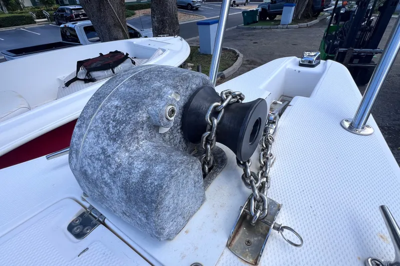 Slide: The Image of Anchor winch on 2001 Cobia 254 Center Console boat deck. - 37