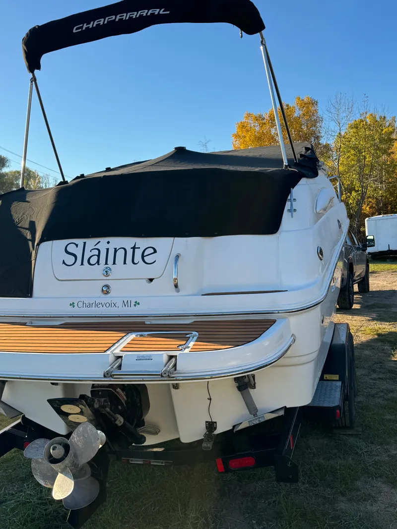Slide: The Image of The image shows a 2004 Chaparral Signature 240 boat named "Sláinte." - 20