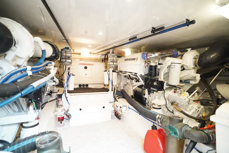 Slide: The Image of Engine room of a 2005 Post 50 Convertible yacht, featuring Series 60 engines. - 24