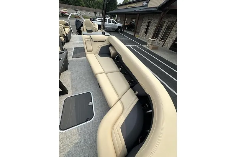 Slide: The Image of Luxurious seating on 2026 Flamingo Rove 24' boat, showcasing beige upholstery and modern design. - 14