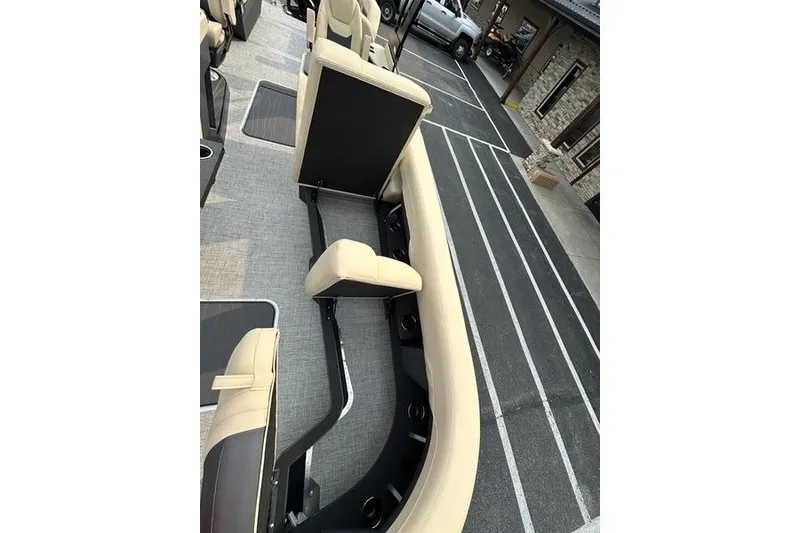 Slide: The Image of Interior view of 2026 Flamingo Rove 24' boat with beige seating and modern design. - 20