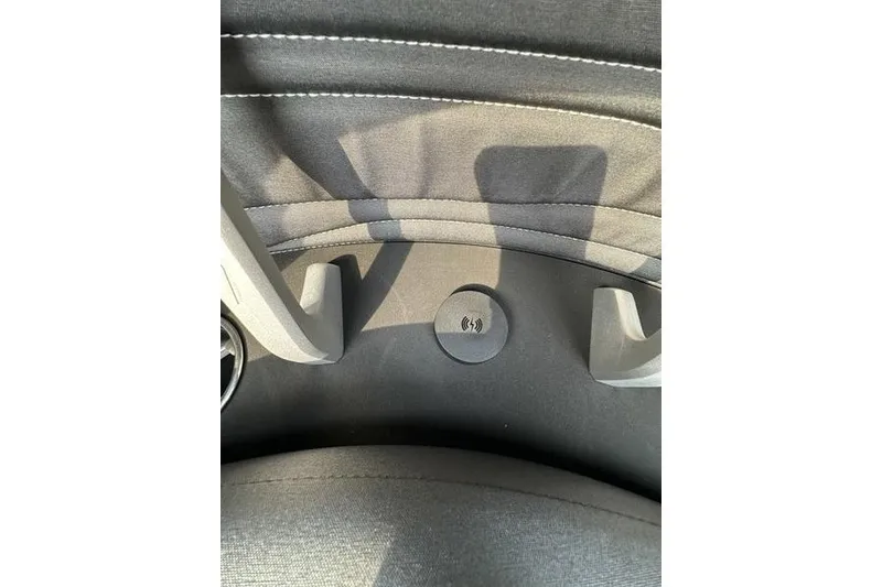 Slide: The Image of Interior of 2026 Flamingo Rove 24' with wireless charging pad and modern design. - 16