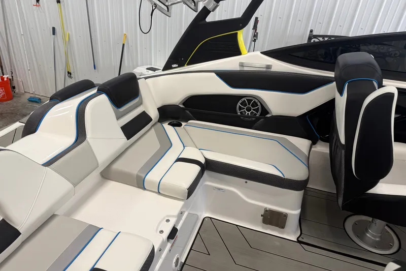 Slide: The Image of 2022 Yamaha Boats 212XD interior with sleek seating and modern design. - 6