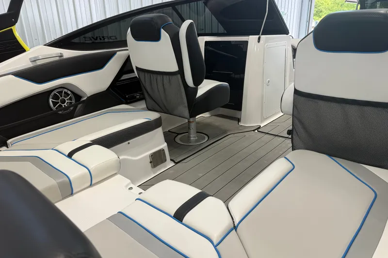 Slide: The Image of 2022 Yamaha Boats 212XD interior with sleek seating and modern design. - 9