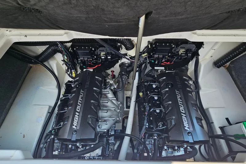Slide: The Image of 2023 Yamaha Boats AR250 engine compartment with dual high-output engines. - 26
