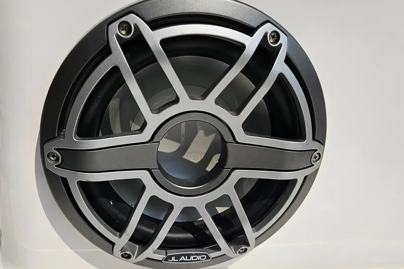 Slide: The Image of Close-up of JL Audio speaker on 2023 Yamaha Boats AR250. - 27