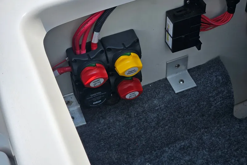 Slide: The Image of Electrical panel of 2023 Yamaha Boats AR250 with switches and wiring. - 29