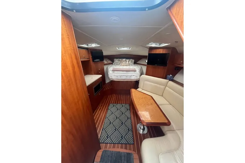 Slide: The Image of Interior of 2006 Tiara 32 OPEN yacht with cozy seating and elegant wood finishes. - 18