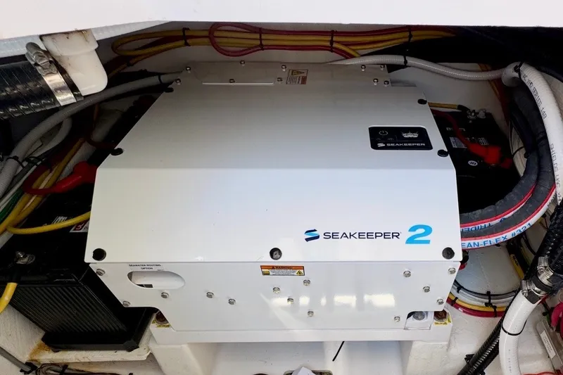 Slide: The Image of Seakeeper 2 stabilizer installed in 2024 Southport 33 DC boat engine compartment. - 33