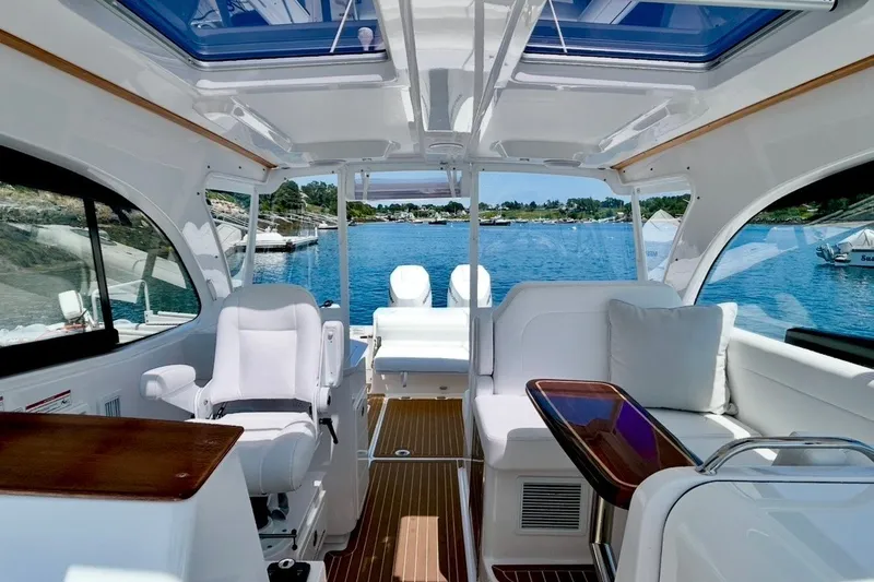 Slide: The Image of Luxurious interior of 2024 Southport 33 DC boat with scenic ocean view. - 26