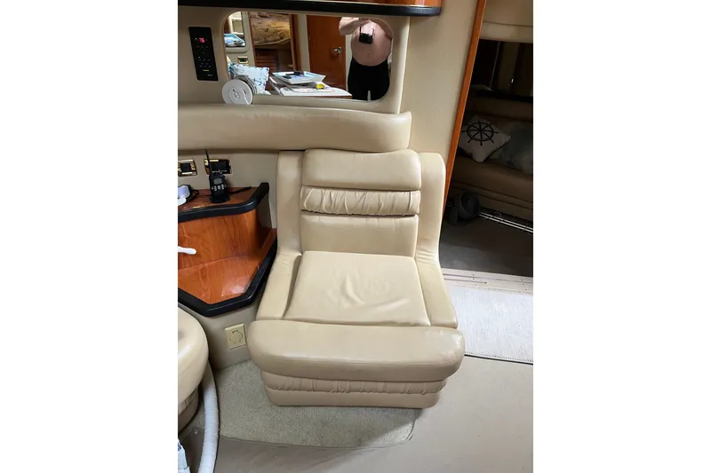 Slide: The Image of Luxurious beige leather seating inside a 2001 Sea Ray Sundancer 460 yacht cabin. - 30