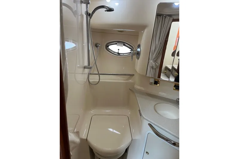 Slide: The Image of Bathroom interior of 2001 Sea Ray Sundancer 460 yacht, featuring shower and sink. - 40