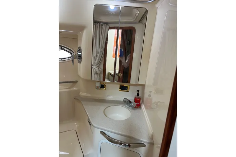 Slide: The Image of Bathroom interior of 2001 Sea Ray Sundancer 460 yacht, featuring sink and mirror. - 41