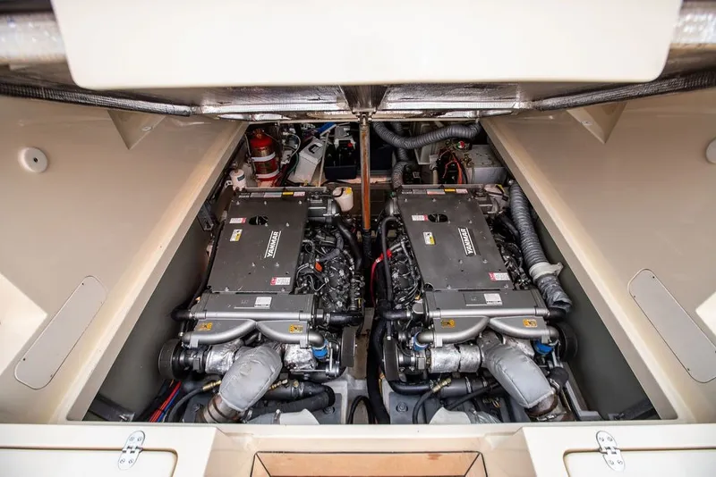 Slide: The Image of Engine compartment of 2012 Hinckley Picnic Boat MKIII with dual Yanmar engines. - 32