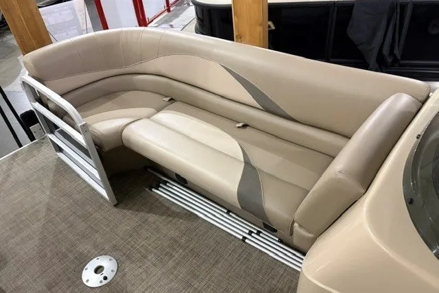 Slide: The Image of Beige seating area on a 2015 SunCatcher V22 RC boat, featuring stylish upholstery. - 5