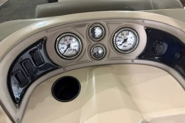 Slide: The Image of Dashboard of 2015 SunCatcher V22 RC boat with gauges and controls. - 6