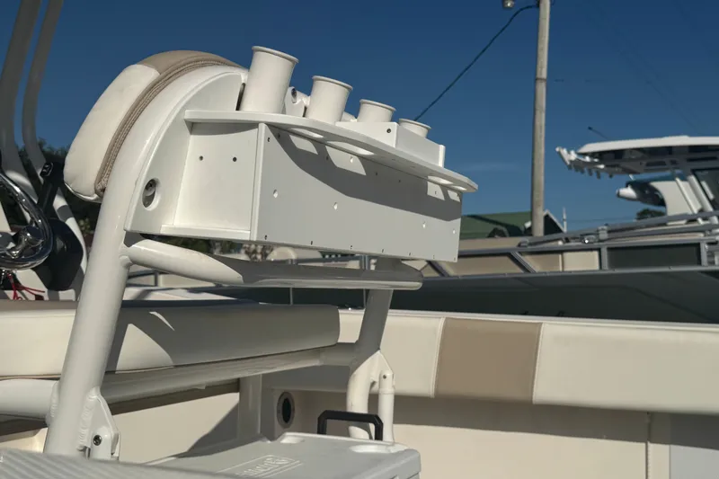 Slide: The Image of 2023 Robalo R200 Center Console boat with rod holders and seating. - 8