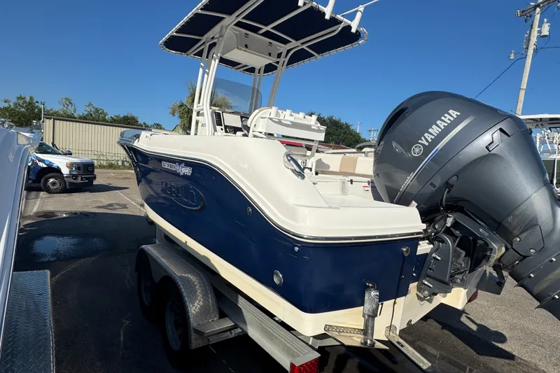 Slide: The Image of 2023 Robalo R200 Center Console boat with Yamaha engine on trailer. - 4