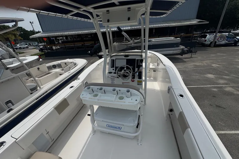 Slide: The Image of 2023 Robalo R200 Center Console boat with spacious deck and modern controls. - 12