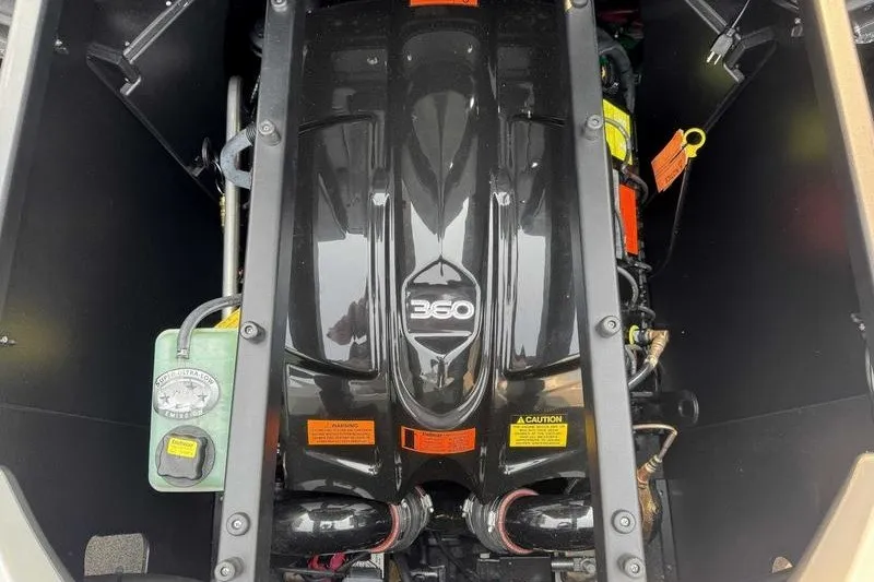 Slide: The Image of Engine compartment of a 2018 Tigé R21 boat, featuring a 360 horsepower engine. - 11