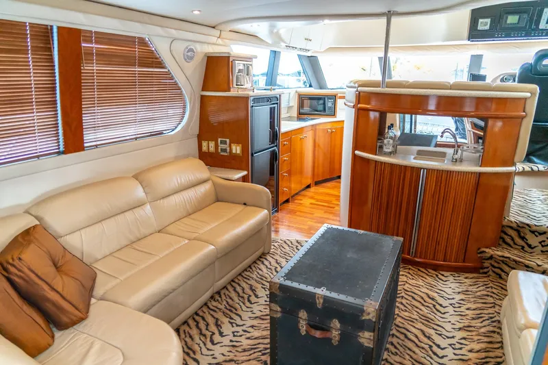Slide: The Image of Luxurious interior of 2000 Carver 450 Voyager Pilothouse with leather seating and kitchenette. - 45