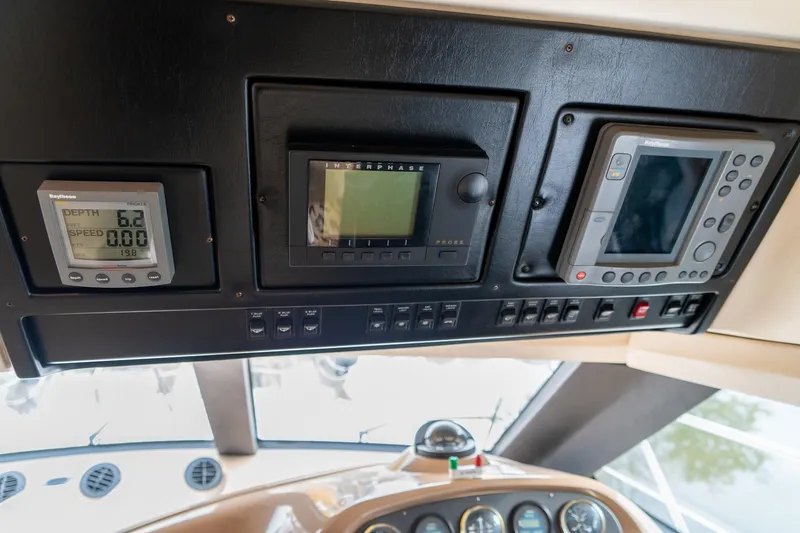 Slide: The Image of Control panel of 2000 Carver 450 Voyager Pilothouse with navigation instruments. - 39
