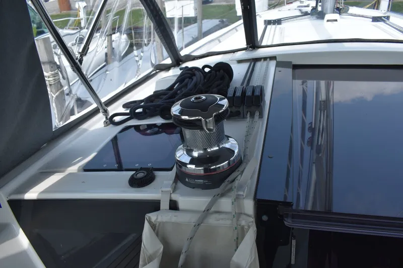 Slide: The Image of Cockpit view of a 2012 Beneteau Oceanis 41.1 sailboat, featuring winch and ropes. - 32