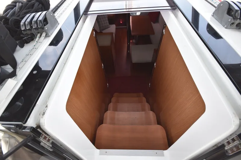 Slide: The Image of Stairway leading to the interior cabin of a 2012 Beneteau Oceanis 41.1 yacht. - 35