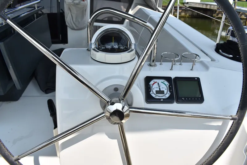 Slide: The Image of Steering wheel and instruments on 2012 Beneteau Oceanis 41.1 yacht cockpit. - 10