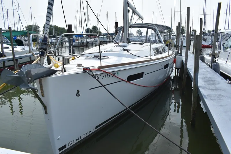 Slide: The Image of Beneteau Oceanis 41.1 sailboat docked at marina, 2012 model, side view. - 1