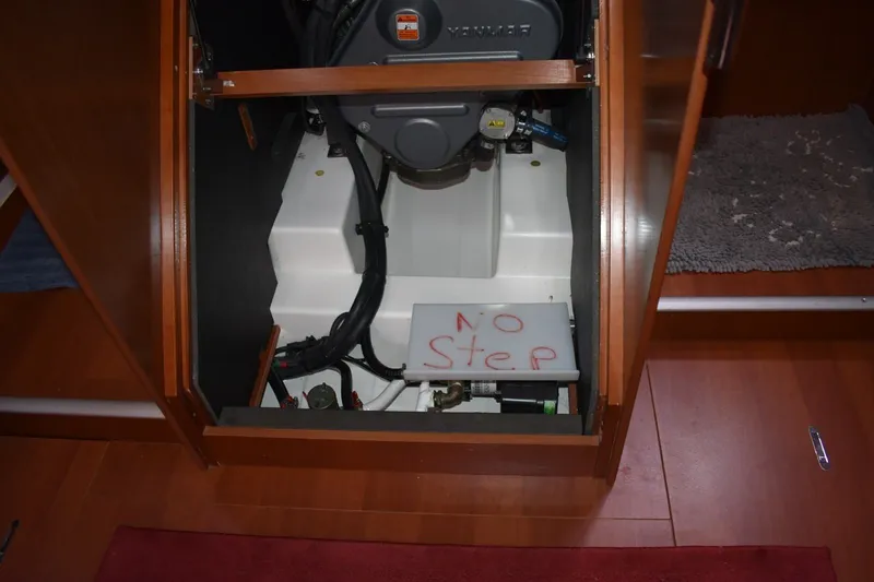 Slide: The Image of Engine compartment of 2012 Beneteau Oceanis 41.1 sailboat with "No Step" warning sign. - 59