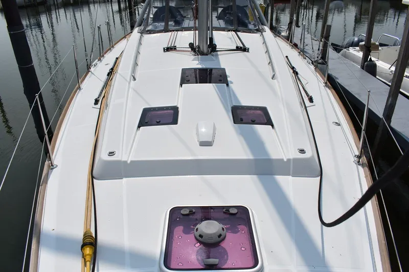 Slide: The Image of Beneteau Oceanis 41.1 sailboat deck, 2012 model, docked at marina. - 24