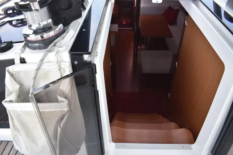 Slide: The Image of Interior view of 2012 Beneteau Oceanis 41.1 yacht, showing stairs and cabin entrance. - 34