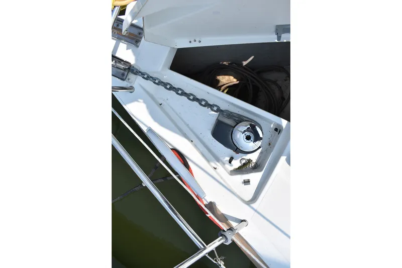 Slide: The Image of Anchor chain and winch on 2012 Beneteau Oceanis 41.1 sailboat deck. - 23