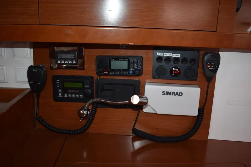 Slide: The Image of Control panel of a 2012 Beneteau Oceanis 41.1 yacht with communication equipment. - 57
