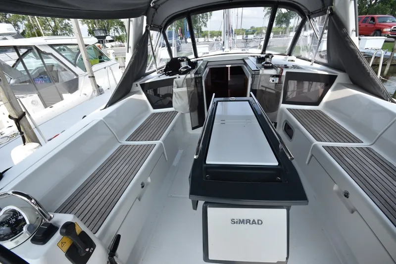 Slide: The Image of Cockpit of 2012 Beneteau Oceanis 41.1 sailboat with seating and navigation equipment. - 13