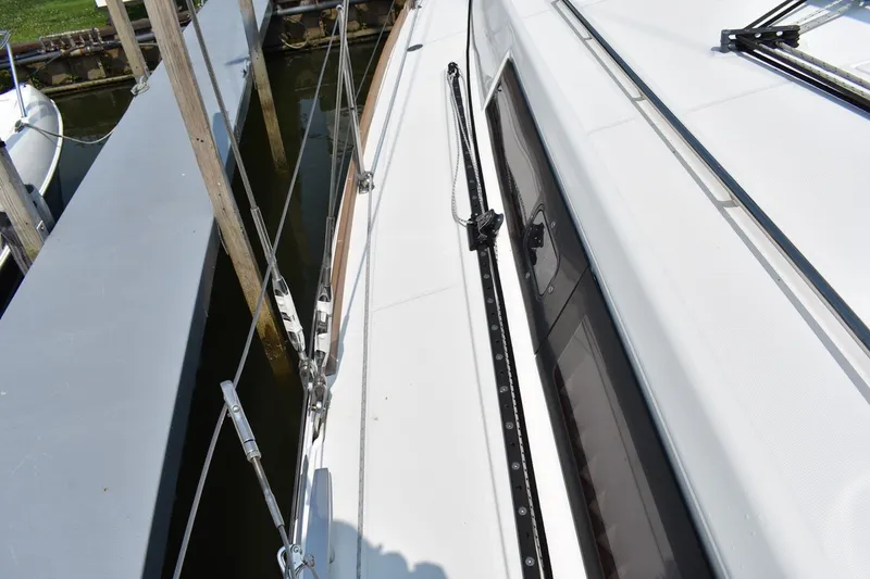 Slide: The Image of Beneteau Oceanis 41.1 (2012) yacht deck view with rigging and window details. - 21