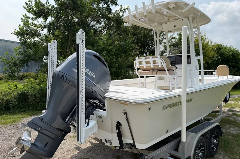Slide: The Image of 2019 Sportsman Masters 227 Bay Boat with Yamaha engine on trailer, parked outdoors. - 6