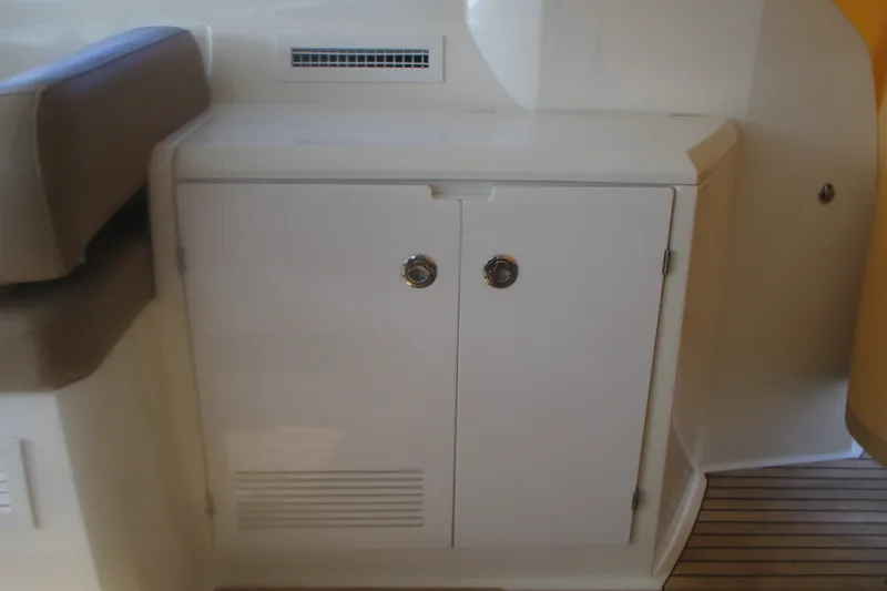 Slide: The Image of Interior cabinet on 2016 Jeanneau Leader 36 yacht with wooden flooring. - 13