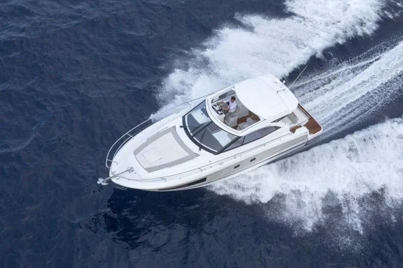 Slide: The Image of Manufacturer Provided Image: 2016 Jeanneau Leader 36 motor yacht cruising on open water. - 34