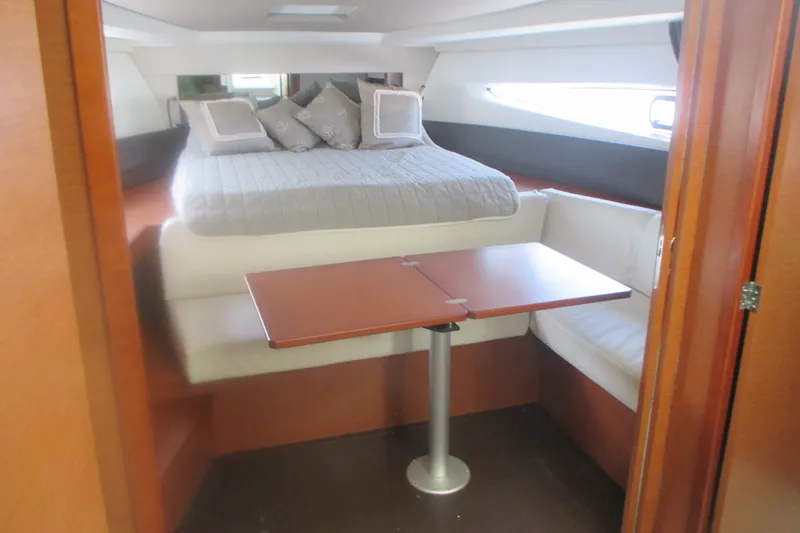 Slide: The Image of Interior of 2016 Jeanneau Leader 36 yacht with bed and seating area. - 21