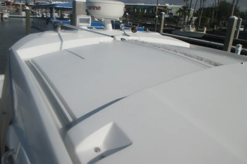 Slide: The Image of 2016 Jeanneau Leader 36 yacht deck view at marina. - 8