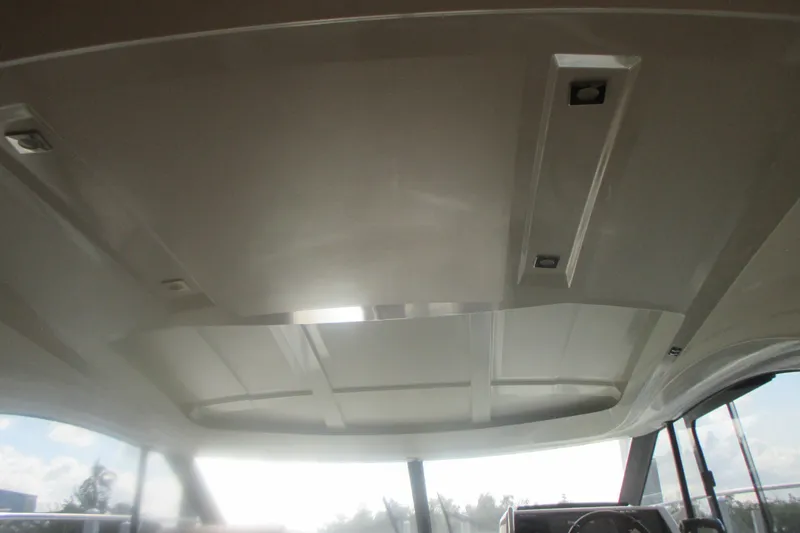Slide: The Image of Interior ceiling of 2016 Jeanneau Leader 36 yacht with modern design elements. - 20