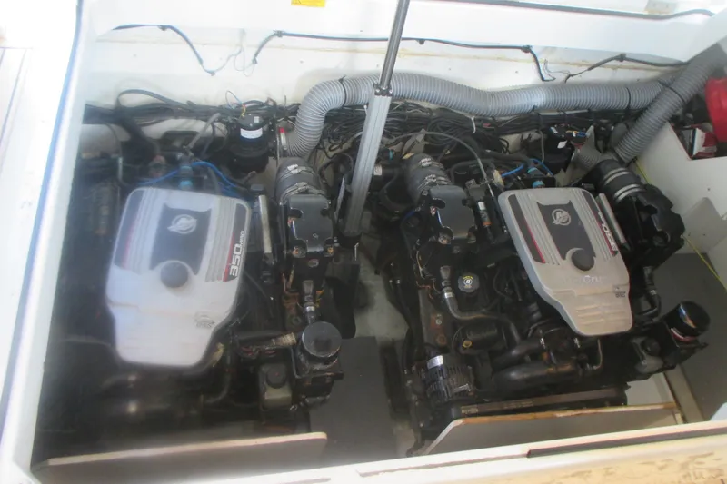 Slide: The Image of Engine compartment of a 2016 Jeanneau Leader 36 with twin MerCruiser 350 MAG engines. - 35