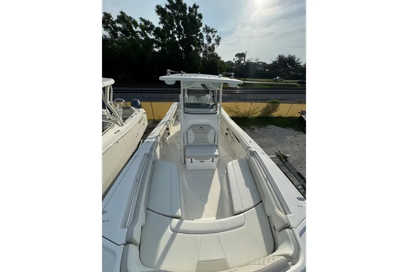 Slide: The Image of 2026 World Cat 295 CC boat with spacious seating and modern design. - 5