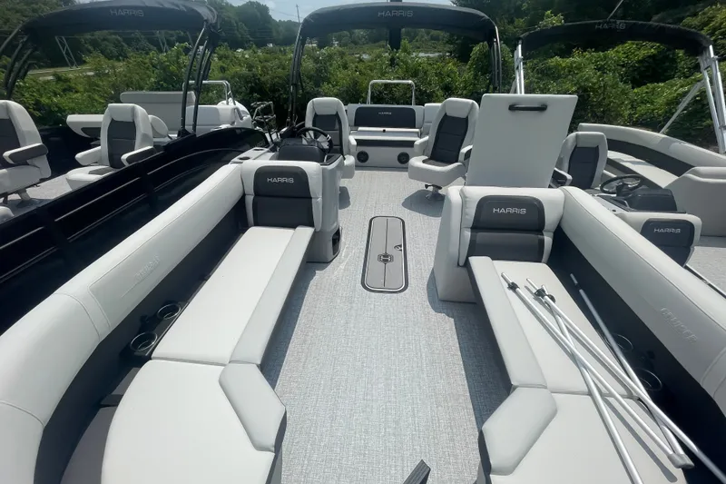 Slide: The Image of 2026 Harris Cruiser 230 SLDH pontoon boat interior with spacious seating and modern design. - 7