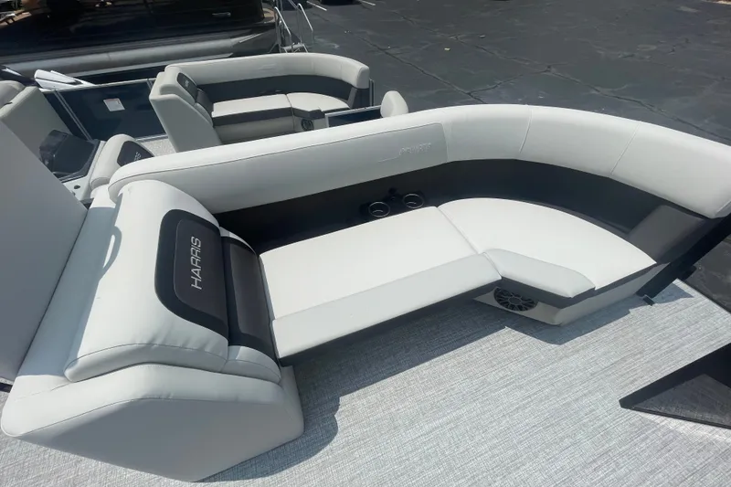 Slide: The Image of 2026 Harris Cruiser 230 SLDH boat interior with luxurious seating and modern design. - 5