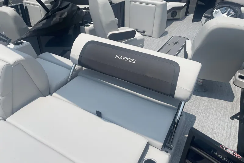 Slide: The Image of 2026 Harris Cruiser 230 SLDH boat interior with luxurious seating and modern design. - 12