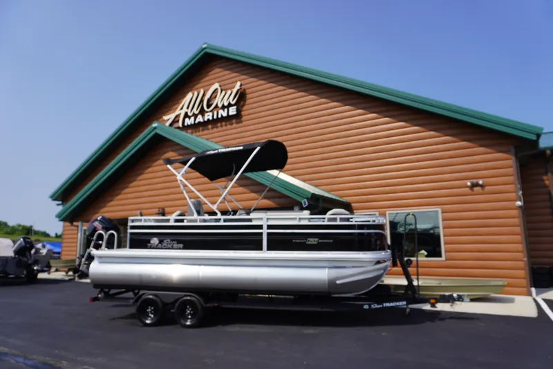 The Image of 2027 Sun Tracker Fishin' Barge 20 DLX pontoon boat at All Out Marine dealership. - 1